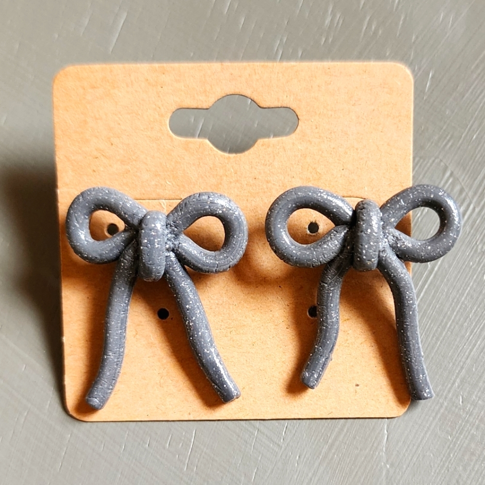 Free w/purchase Grey Clay Bow Post Earrings